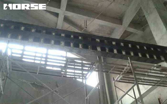 Carbon fiber structural reinforcement for seismic retrofit