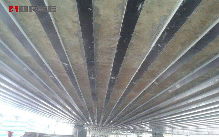 Bridge reinforcement by carbon fiber laminate