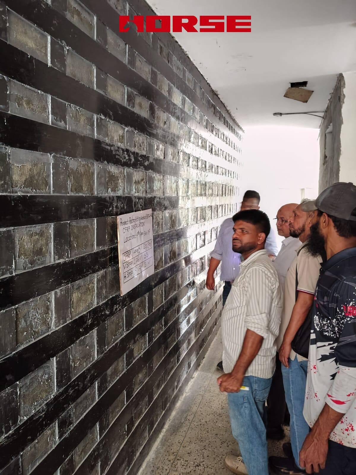 Retrofitting Concrete Walls Using CFRP Laminate