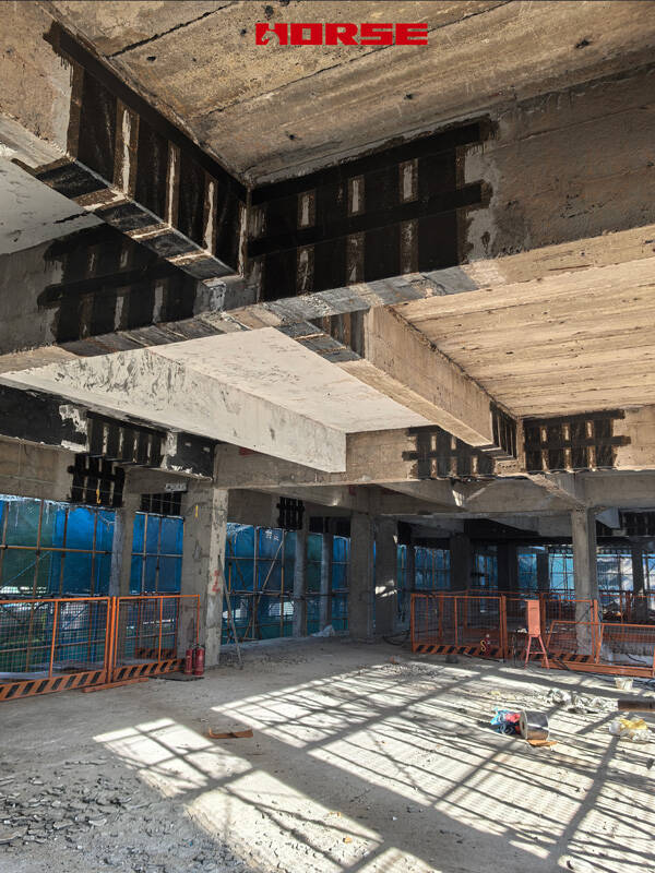 Rehabilitation of Reinforced Concrete Beams Using Carbon Fiber