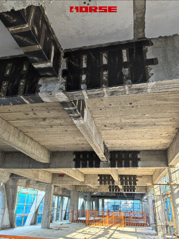 Rehabilitation of Reinforced Concrete Beams Using Carbon Fiber