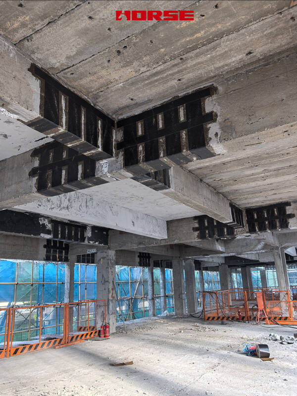 Rehabilitation of Reinforced Concrete Beams Using Carbon Fiber