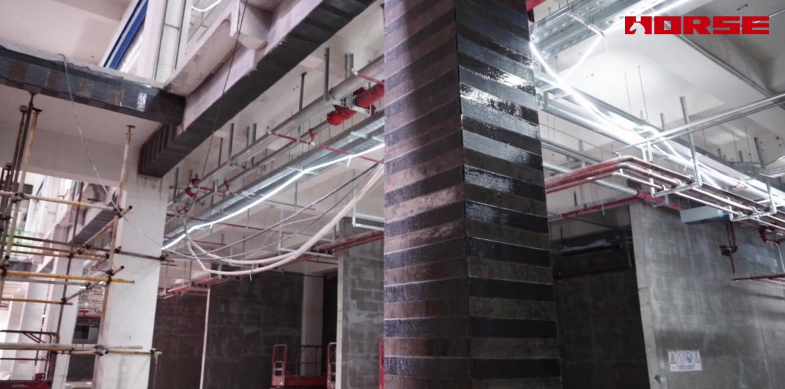 Structural Retrofit with Carbon Fiber after Floor Slab Demolition